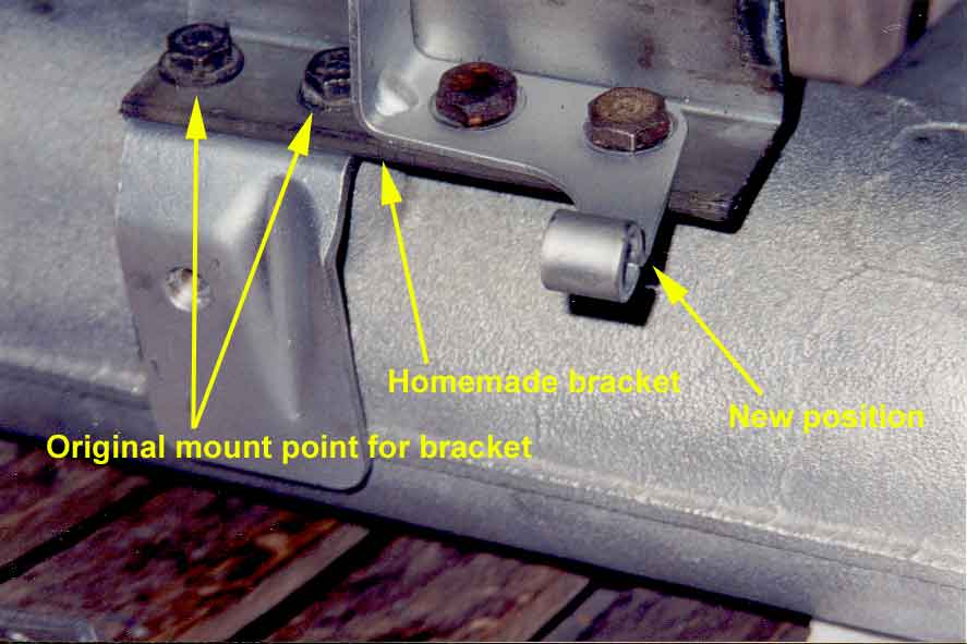 photo showing the modified transmission kick-down cable bracket
